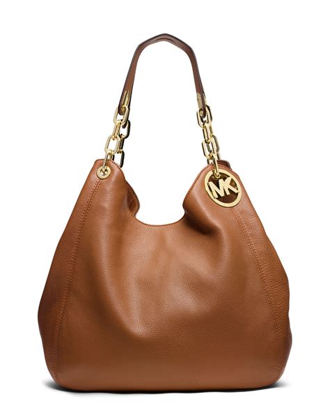 michael kors hand bags fulton large charm shoulder tote brown|Michael Kors fulton shoulder bag.